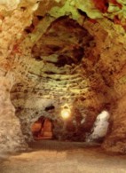A nice inner pond with a traditional mill and a cave