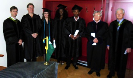 From left to right: Dr. Matthew Adamson, Dr. Robert Trader, guest professor from the home campus, Clare Farrell, Dorcas Mitchell, Idamina Babarinsa, Dean László Frenyó, Dr. Gábor Drexler 