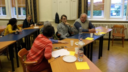 Members of the audience and jury, awaiting the results.
